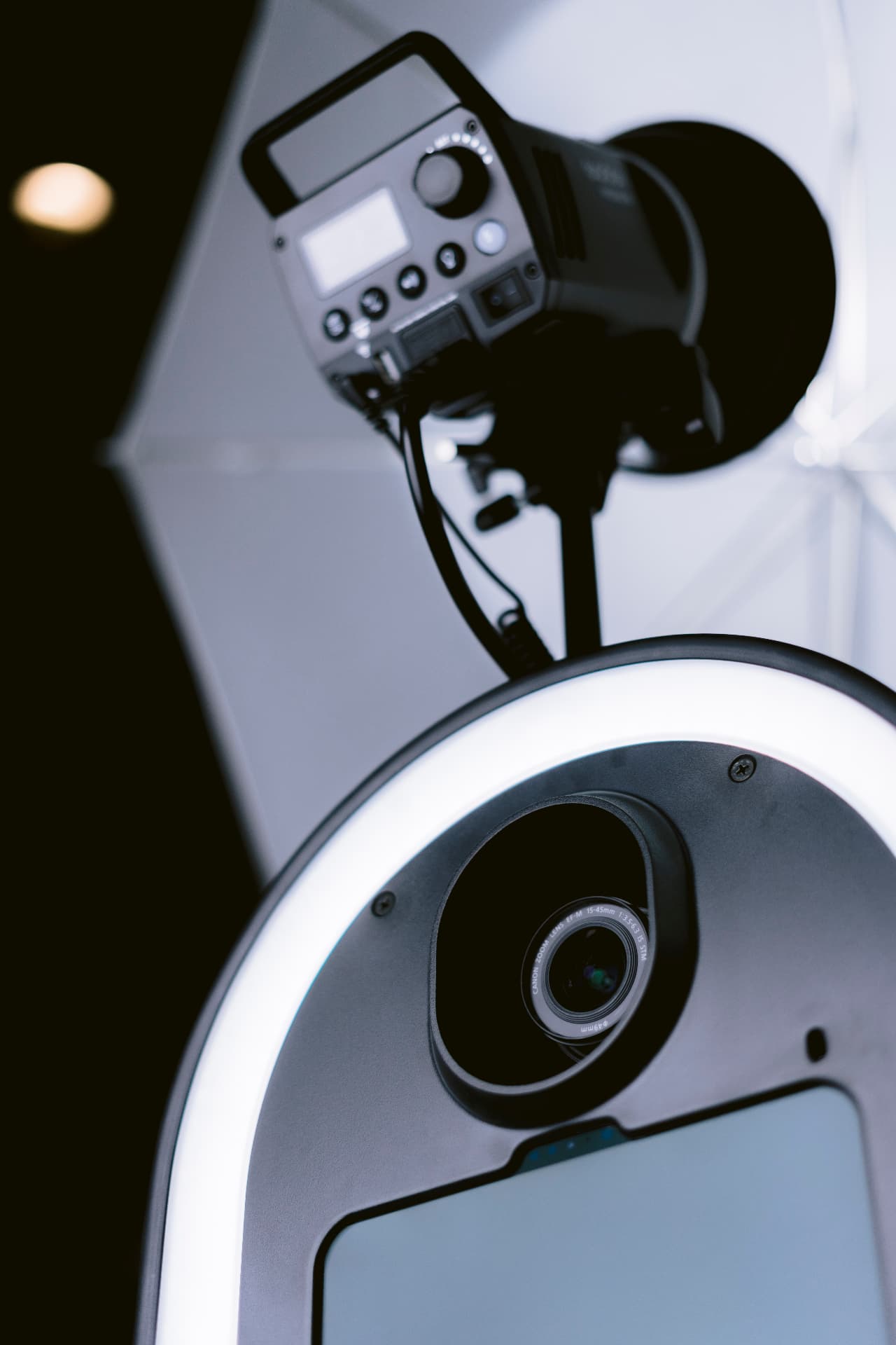 Close-up of the booth ring light and professional camera lens